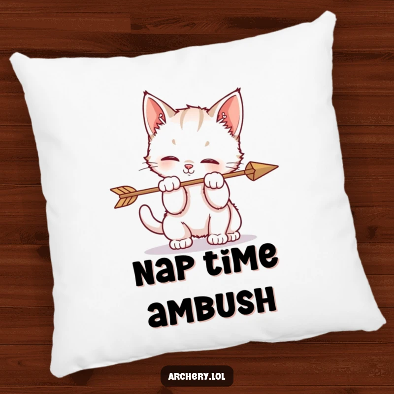Funny pillow featuring a kitten hilariously batting at an arrow, offering adorable comfort and a touch of playful chaos.