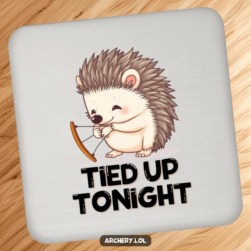 Funny drink coaster showcasing a curious hedgehog intently trying to string a miniature bow, adding whimsy.