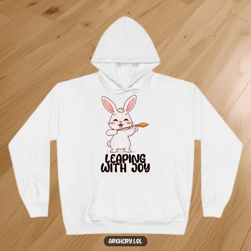 Funny Rabbit Archer Hoodie: A cheerful rabbit smiles brightly while shooting an arrow, spreading joy and warmth.