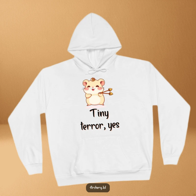 Funny hamster hoodie showing a happy hamster aiming a miniature arrow, radiating warmth and tiny-hero energy.