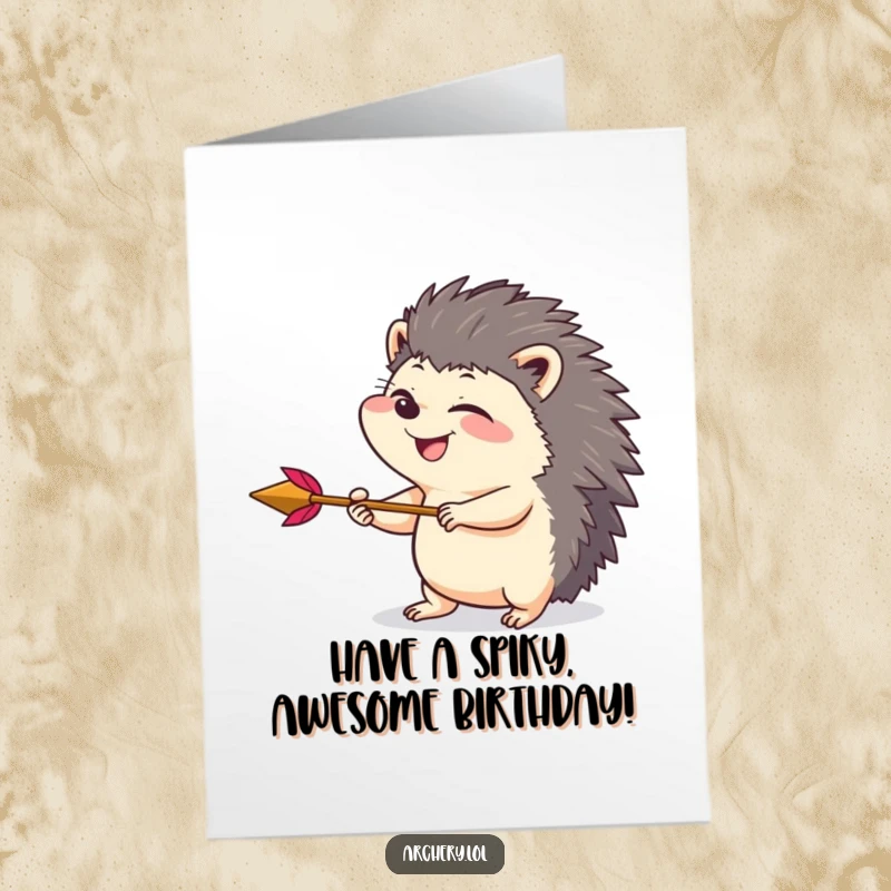 Funny Free Printable Birthday Card: Giggling hedgehog draws back an arrow with playful intensity, ready to shoot birthday cheer.