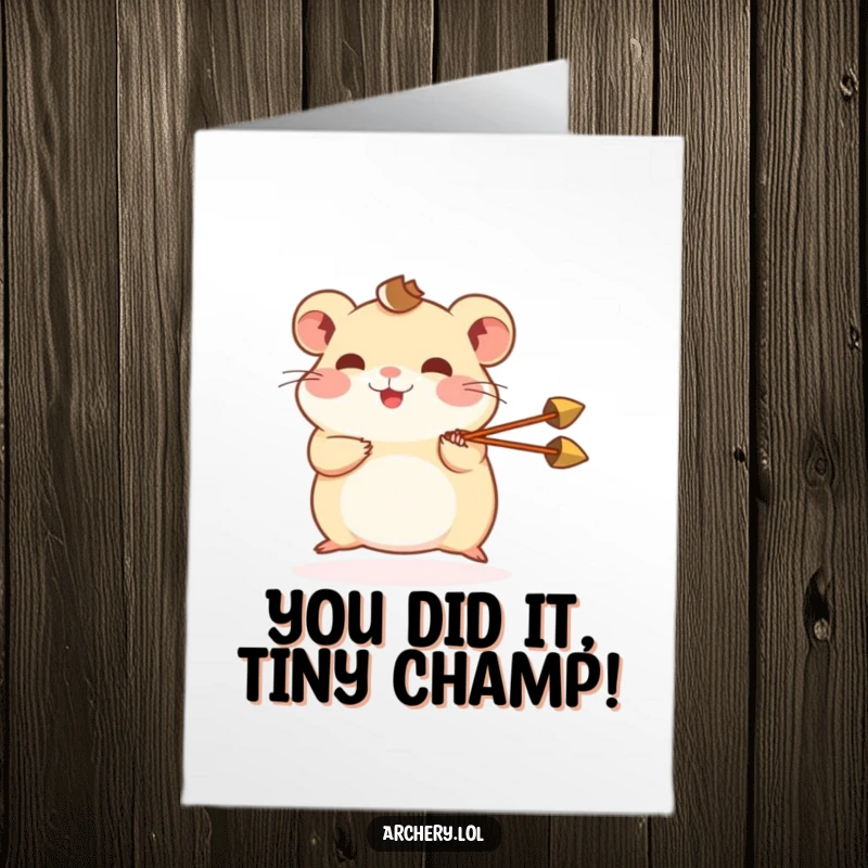 Funny Free Printable Congratulations Card: Cute hamster joyfully shooting a tiny arrow, celebrating your triumph.