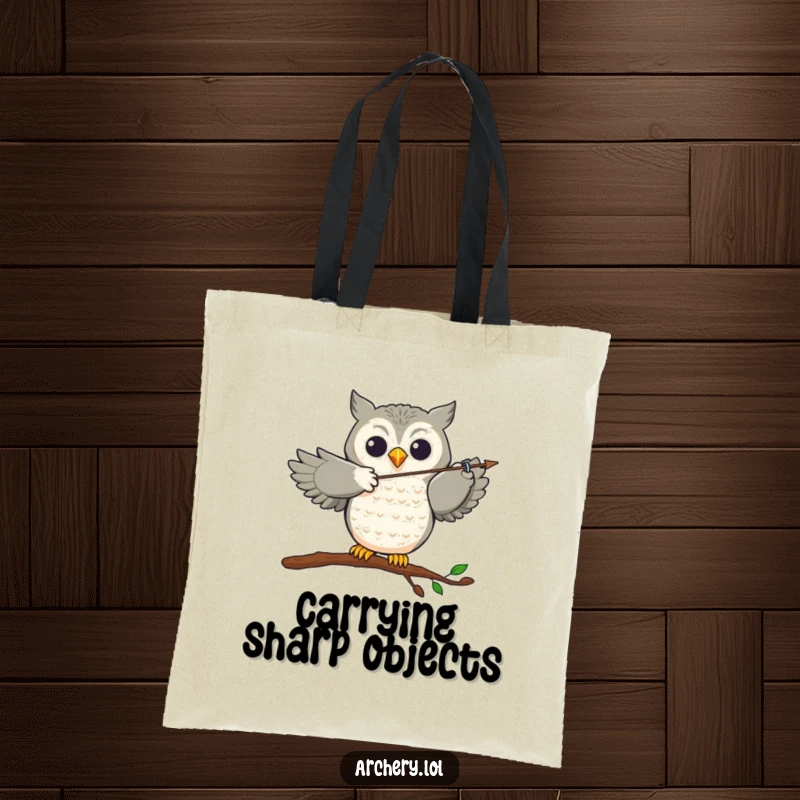 Funny Tote Bag: A joyful owl perched, aiming an arrow with precision, ready for action, perfect for carrying items.