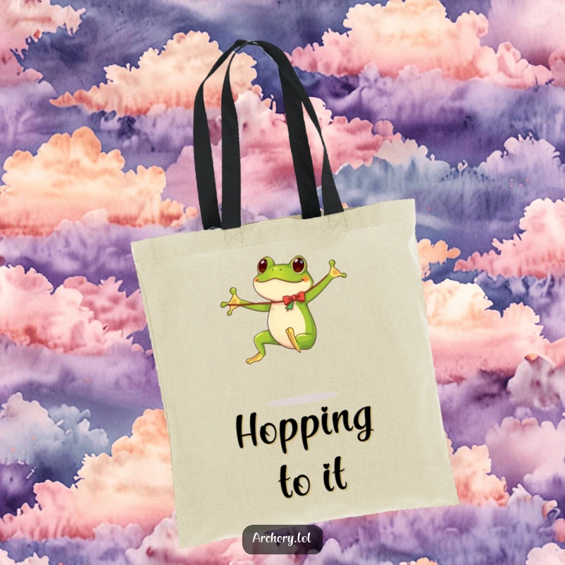 Funny tote bag illustration of a frog gleefully bouncing while awkwardly holding a long, flimsy bow.